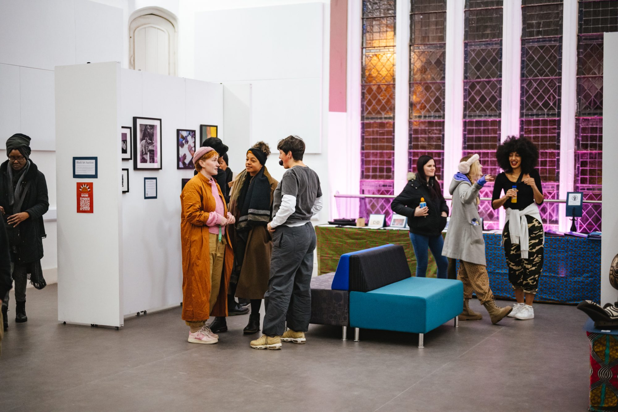 © Khali Ackford - Black Creatives Gala for Chris Kaba groups of people chatting in an art gallery spsace